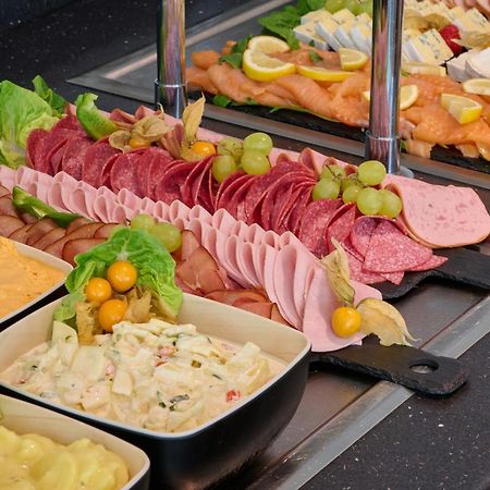 Leonardo Hotel&Residenz Muenchen Exterior foto Breakfast buffet