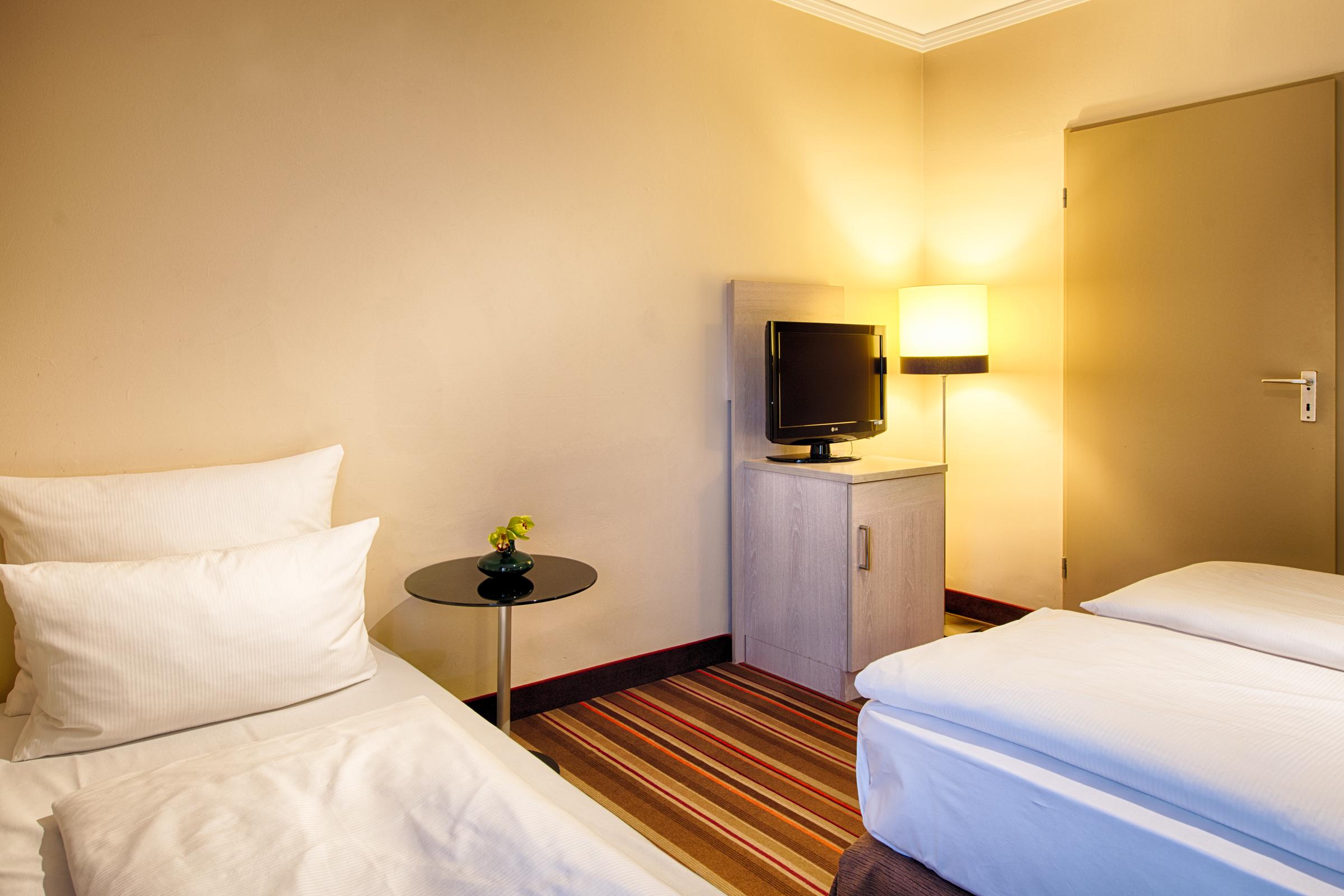 Leonardo Hotel&Residenz Muenchen Exterior foto A room at the hotel