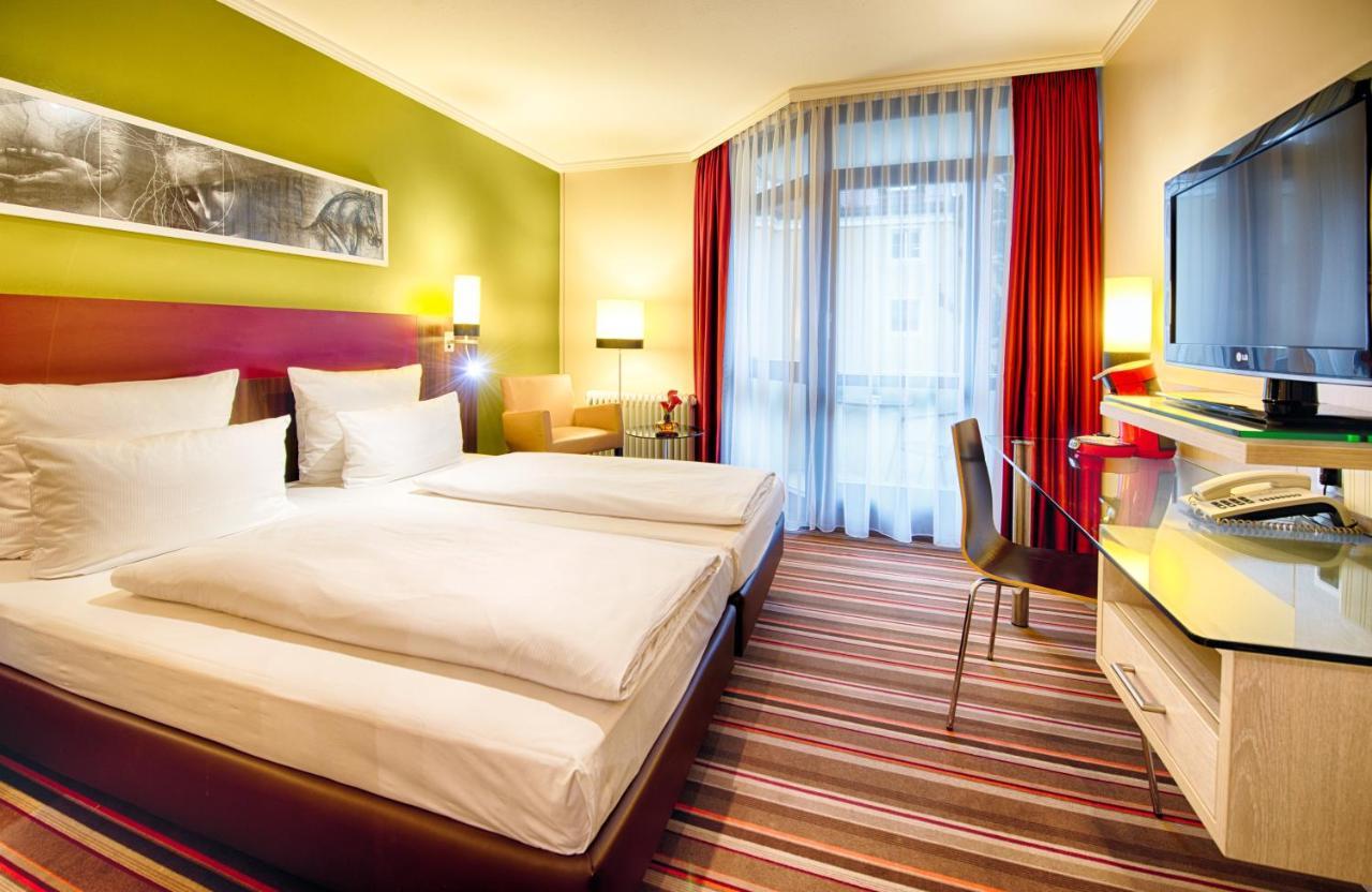 Leonardo Hotel&Residenz Muenchen Exterior foto Room of a hotel