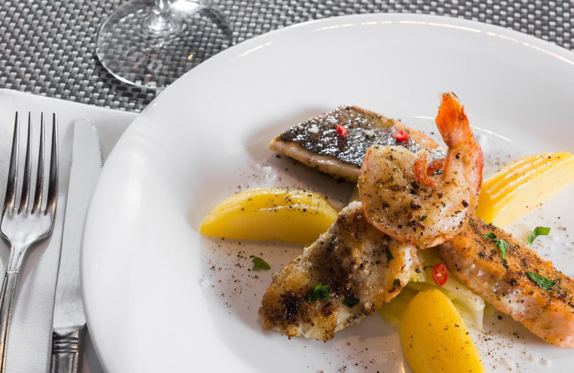 Leonardo Hotel&Residenz Muenchen Exterior foto A plate of food